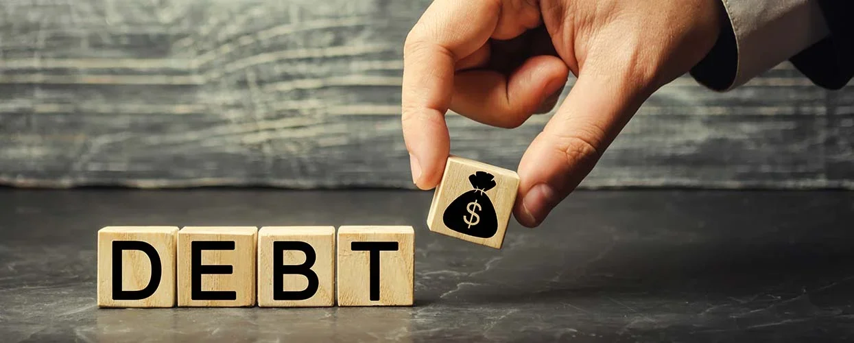 blocks spelled DEBT