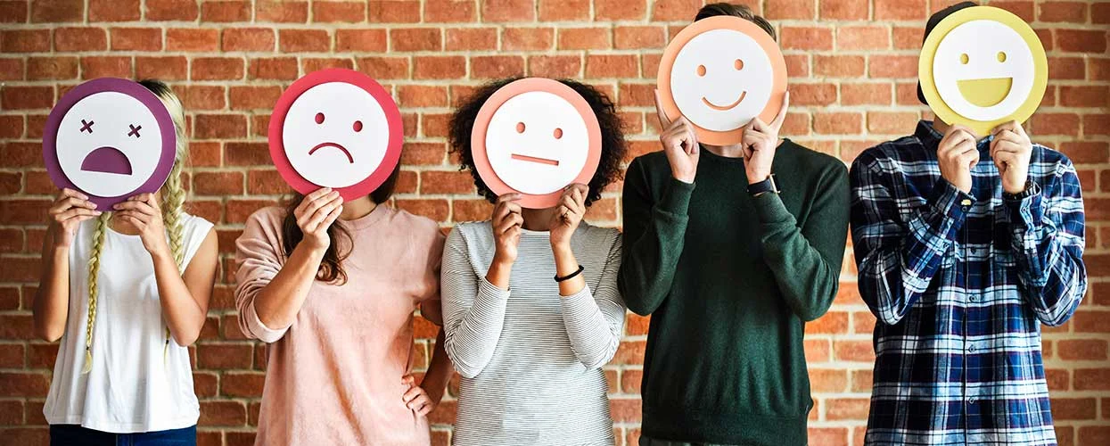 people holding paper emotions