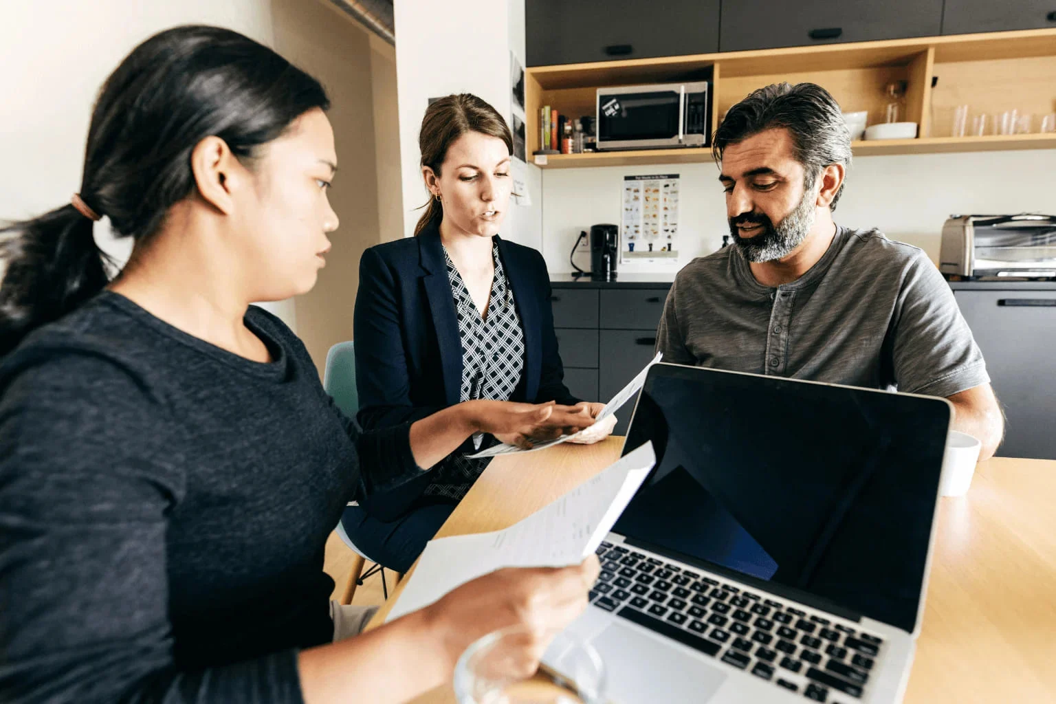 Homebuyer Mistakes in Orinda First-time home buyers reviewing mortgage | Homebuyer Mistakes in Orinda