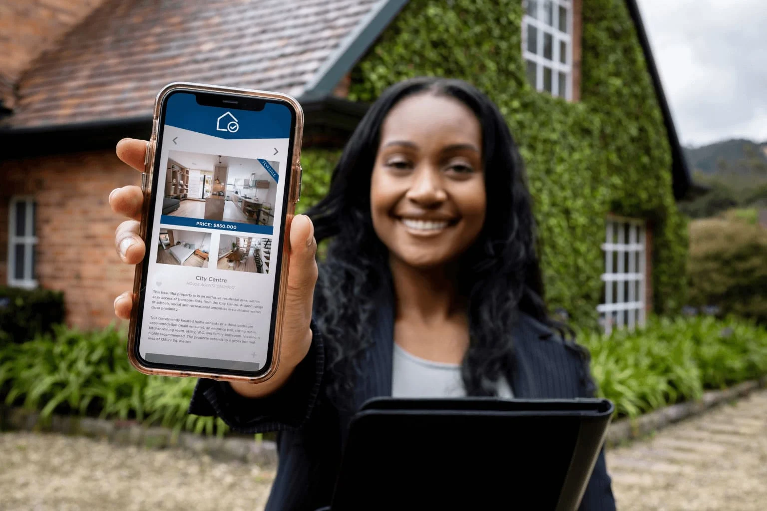 Pleasanton Realtor Social media on phone with real estate listings