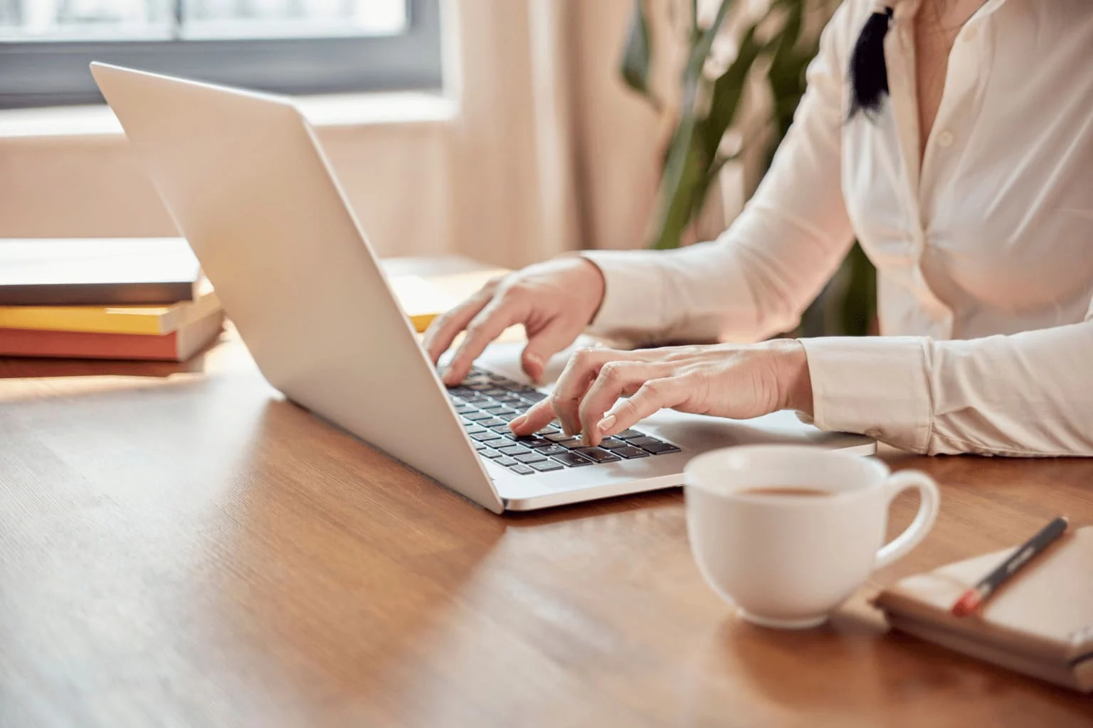 a woman working on her laptop