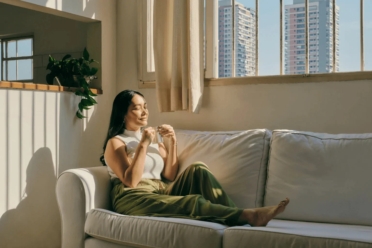 a woman relaxing in the living room